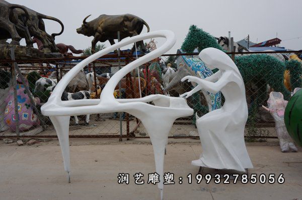 公司玻璃钢弹钢琴人物雕塑